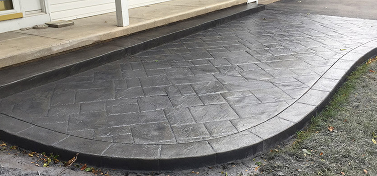 Fractured Cyprus Slate Stamped Residential Driveway Installation  