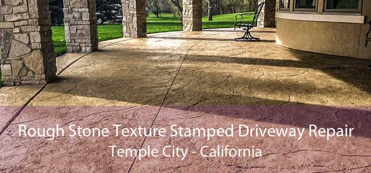 Rough Stone Texture Stamped Driveway Repair Temple City - California