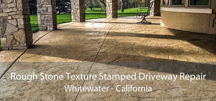 Rough Stone Texture Stamped Driveway Repair Whitewater - California